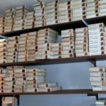 shelf full of house of miniatures kits
